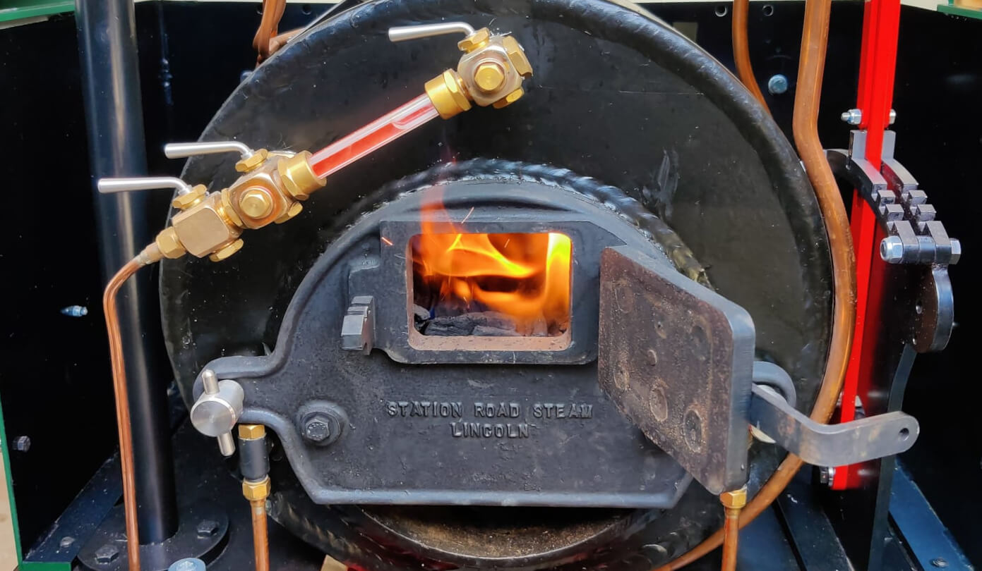 The first layer of coal burning in the firebox right after ignition