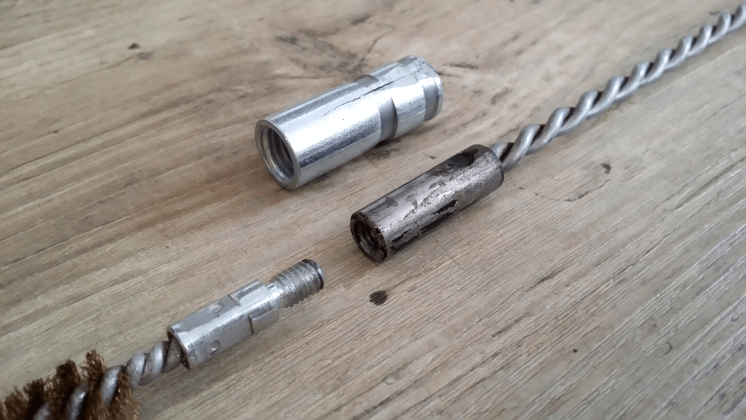 Rod with clamped nut and original, broken nut